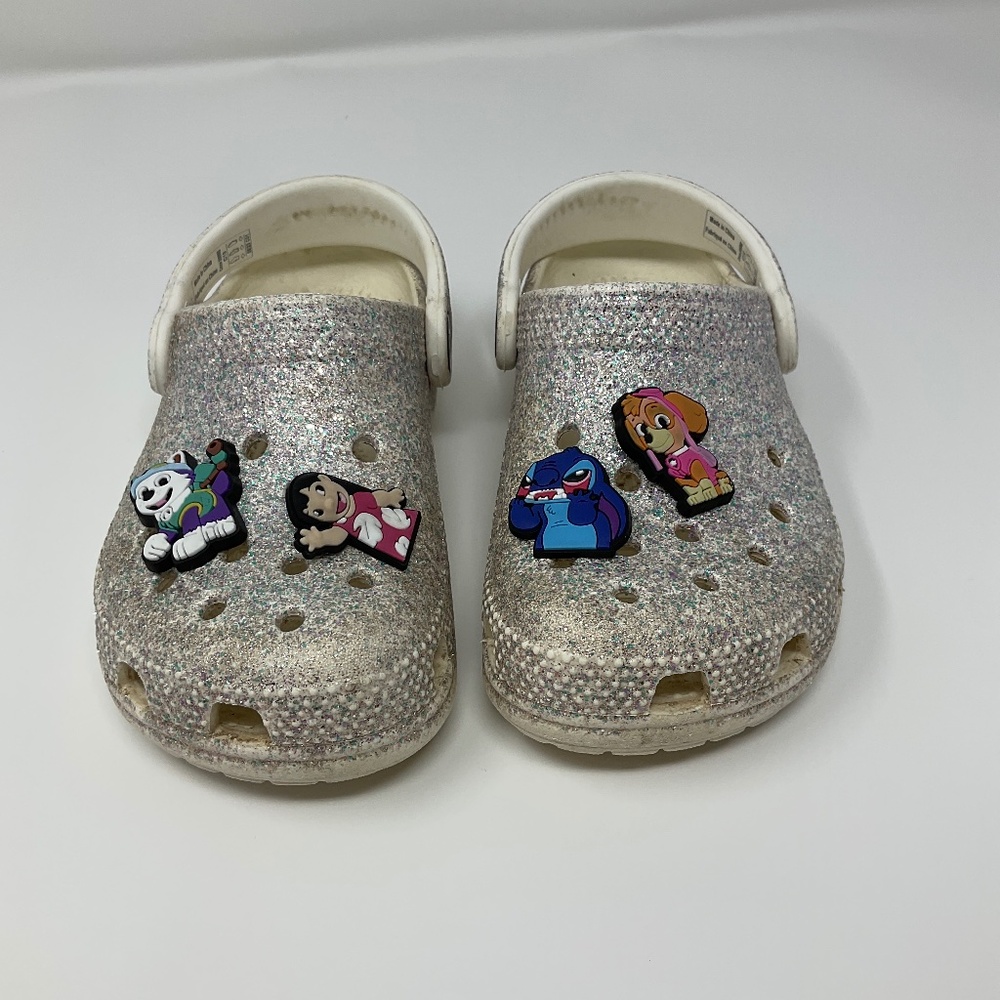 Crocs, child size 10 silver sparkles. K158